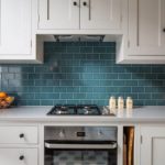 Quirky retro Shaker kitchen with quartz worktop and Fired Earth Retro green Metro tiles 1024x683 1