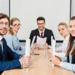 stock photo team smiling business people sitting